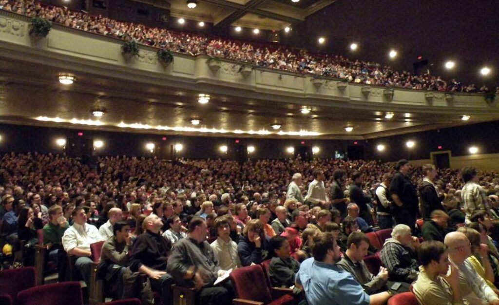 Photo of full audience at Northrop Theater.