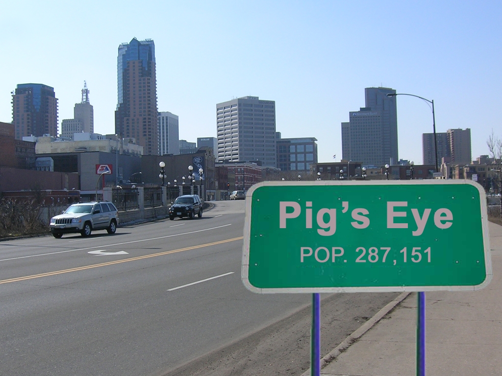 Photo of the Saint Paul skyline with a population sign in the foreground, altered to read "Pig's Eye".