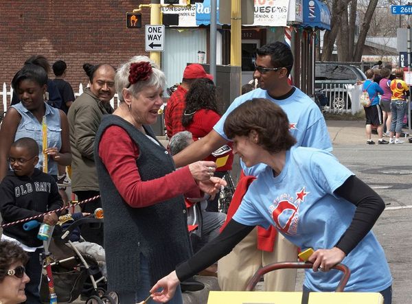 Photo of handing out Get Out of Hell Free cards.