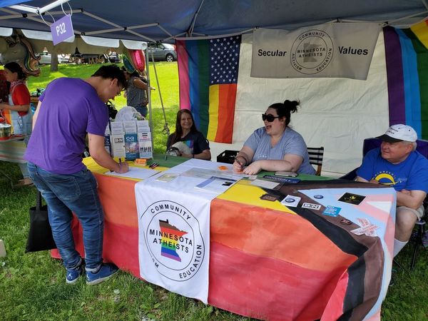 Photo at the Pride booth.